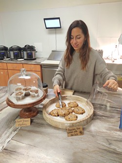 BAKING RAD Local restaurateur Aubriel Ruano has been operating Nosh Paleo Cafe in Nipomo since November. Her dessert menu changes on a daily basis, but her sugarless chocolate chip cookies and muffins are nearly always available. - PHOTO BY CALEB WISEBLOOD